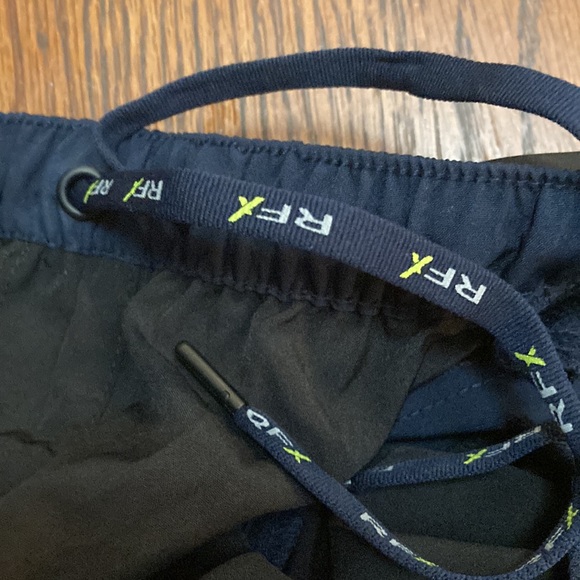 NWT. Rain Forest is water resistant shorts. They are thin durable fabric. - Picture 7 of 8